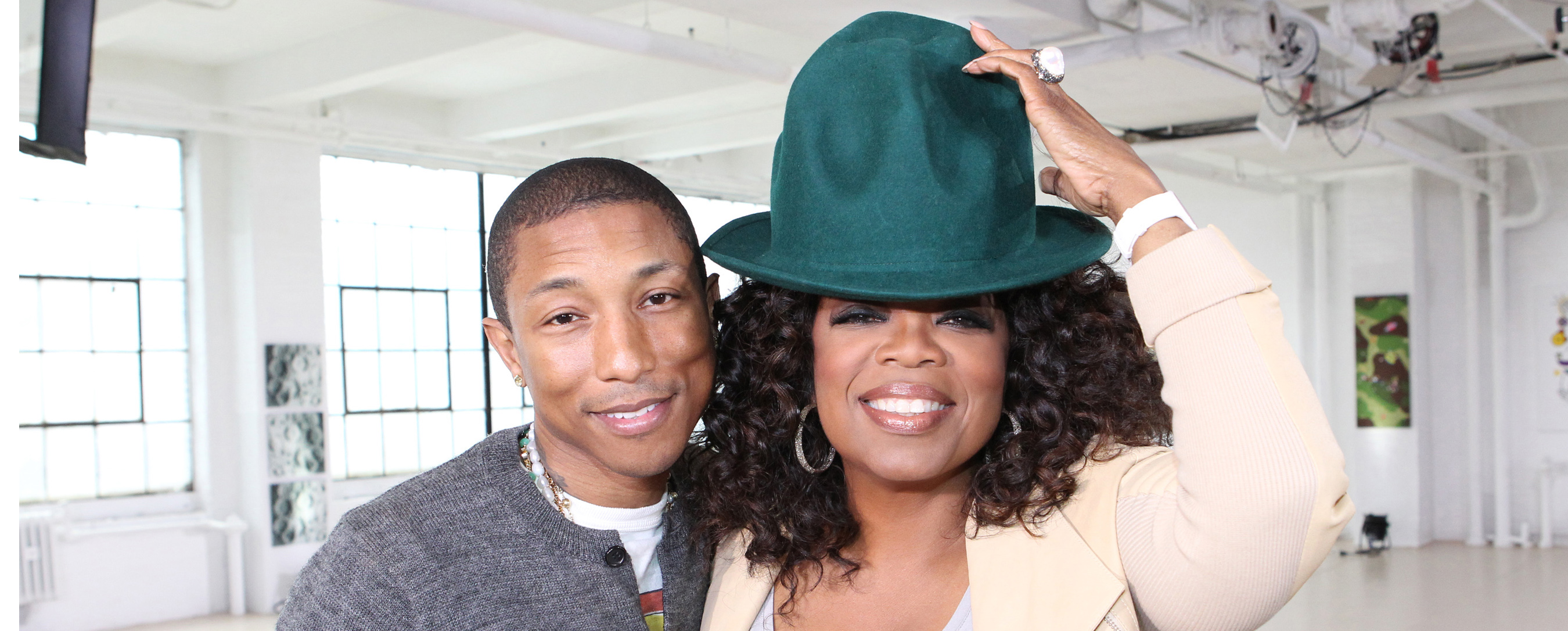 Pharrell with Oprah and His Trademark Vivienne Westwood Hat