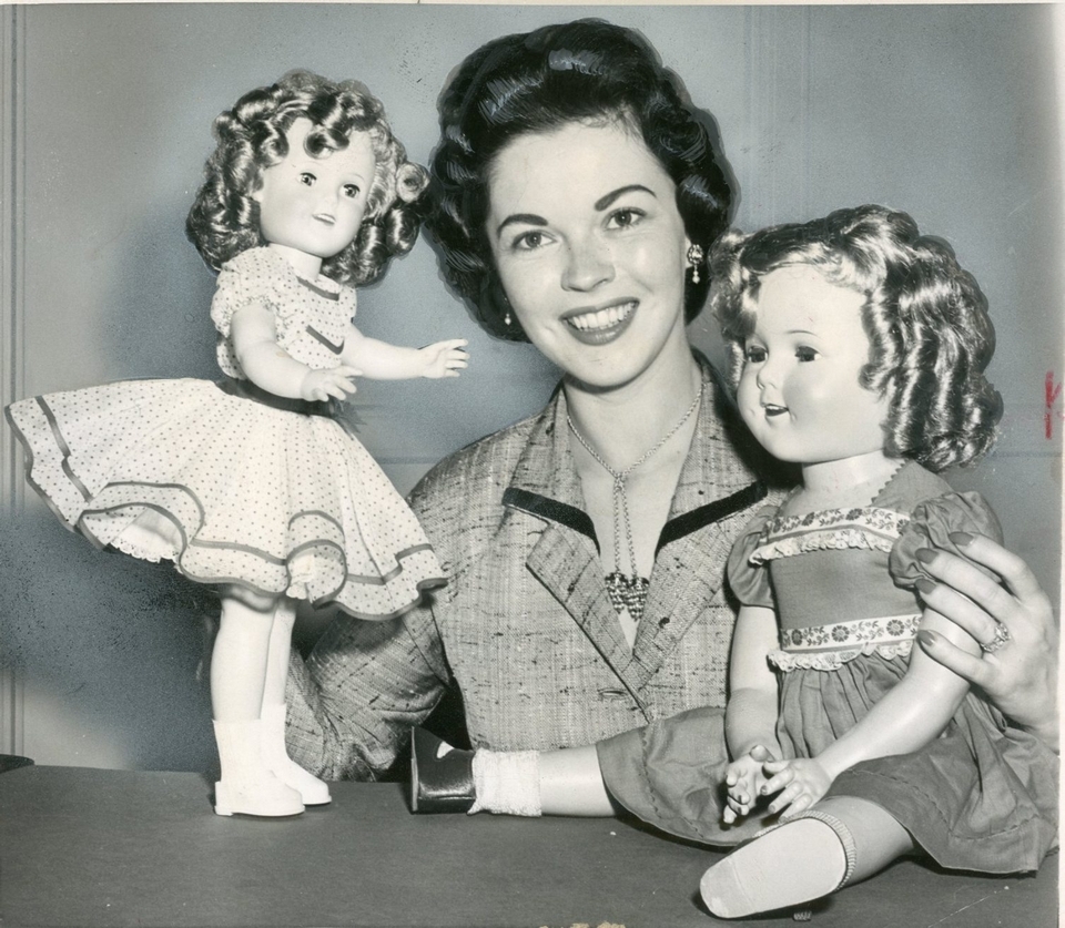 Shirley Temple and her dolls