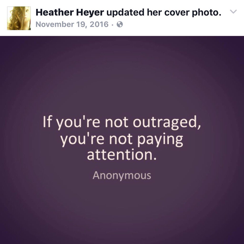 Image is a capture of Heather Heyer's Facebook cover photo update dated November 19, 2016. It shows a dark purple background with white words reading "If you're not outraged, you're not paying attention. Anonymous"